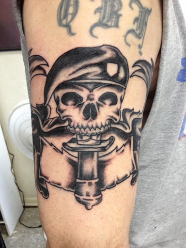 Explore spine tattoo ideas, creative tattoo ideas in Muncie, available at The Tattoo Studio