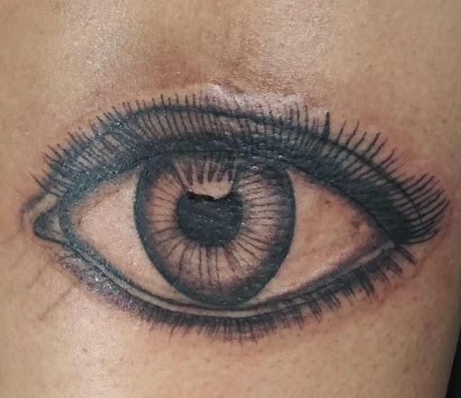 Explore fine line hand tattoo ideas, creative tattoo ideas in Ozark, available at Tooth & Nail Tattoo & Piercing