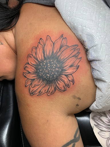 Explore dad and daughter tattoo ideas, creative tattoo ideas in Kirksville, available at Bedford Legacy Tattoo and Body Piercing