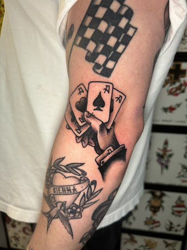 Explore word tattoo ideas for men, creative tattoo ideas in Derwood, available at Tattoo Paradise