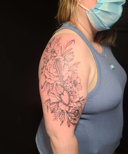Explore snake tattoo idea, creative tattoo ideas in Stevens Point, available at International Ink Tattoos