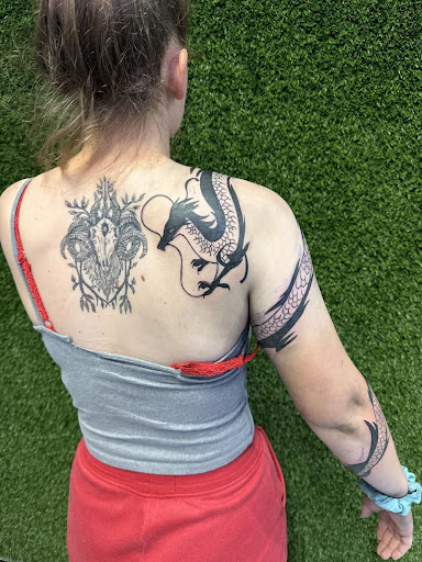 Explore pansy tattoo ideas, creative tattoo ideas in Cocoa, available at Rorschach Tattoo Shop and Piercing Studio