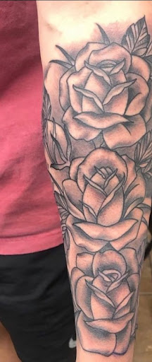 Explore flower tattoo ideas for men, creative tattoo ideas in Chandler, available at Ranger Tattoo & Piercing