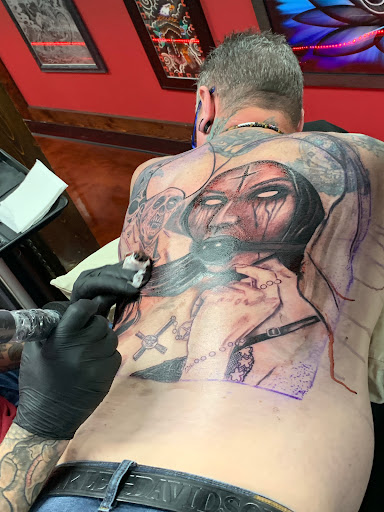 Explore back piece tattoo ideas female, creative tattoo ideas in Bridgeport, available at Breaking skin tattoo and body piercing