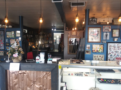 Explore tattoos ideas for men cross, creative tattoo ideas in Grand Junction, available at Calamity Janes Tattoo & Piercing