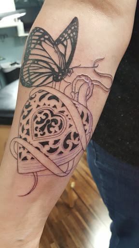 Tattoo Shop «Modern Electric Tattoo and Body Piercing», reviews and photos, 411 S Wesleyan Blvd, Rocky Mount, NC 27803, USA