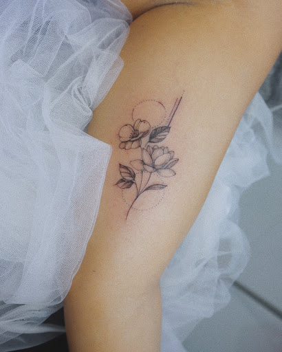 Explore april birthday tattoo ideas, creative tattoo ideas in Orange, available at Baron Art Tattoo