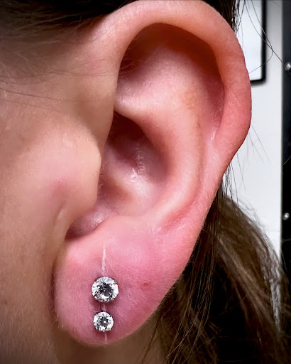 Explore mens spine tattoo ideas, creative tattoo ideas in Hastings, available at Black Diamond Tattoo