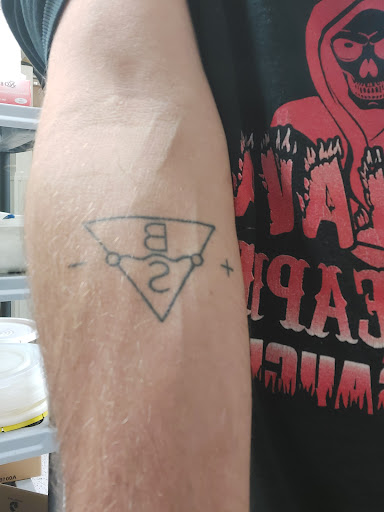 Explore cash tattoo ideas, creative tattoo ideas in Omaha, available at Black Squirrel Omaha