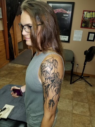 Find simple tree tattoo ideas for your next unique tattoo in Conway at Primal Urge Tattoos