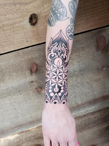 Explore tattoo name cover up ideas on wrist, creative tattoo ideas in Greencastle, available at Incognito Tattoo Studio