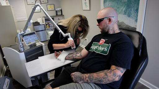 Explore black mamba tattoo ideas, creative tattoo ideas in Rochester, available at Rochester Tattoo Removal