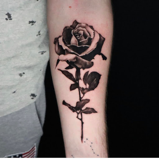 Explore fox and the hound tattoo ideas, creative tattoo ideas in Jamestown, available at Black Cherry Tattoo Co.