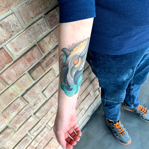 Explore leg flower tattoo ideas, creative tattoo ideas in Tallmadge, available at Killjoy tattoo