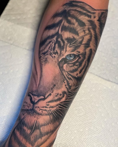 Explore thigh tattoo ideas for women, creative tattoo ideas in Ronkonkoma, available at Velvet Tattoo Parlor LLC