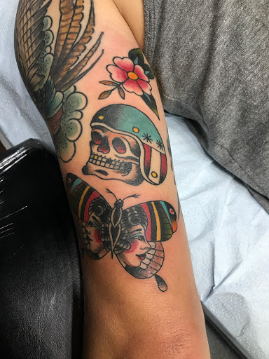 Explore mens sleeve tattoo filler ideas, creative tattoo ideas in Sioux Falls, available at Tim Jewell Tattooer