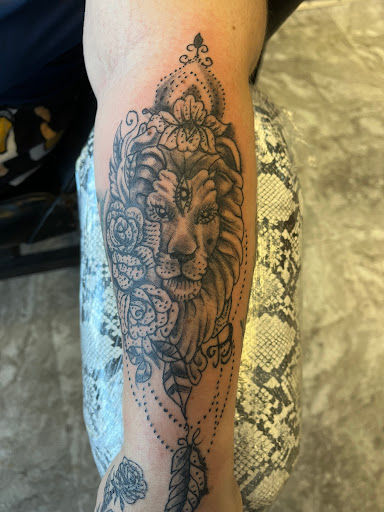 Explore i love you to the moon and back tattoo ideas, creative tattoo ideas in Seymour, available at American Gypsy Tattoo Corp.