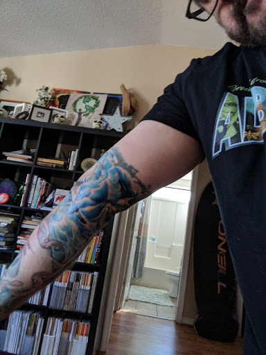 Explore waist tattoo ideas, creative tattoo ideas in Charleston, available at Holy City Tattooing Collective