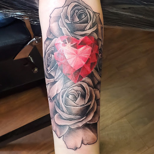 Explore upper arm tattoo ideas for guys, creative tattoo ideas in Tupelo, available at Primal Ink Tattoo Studio