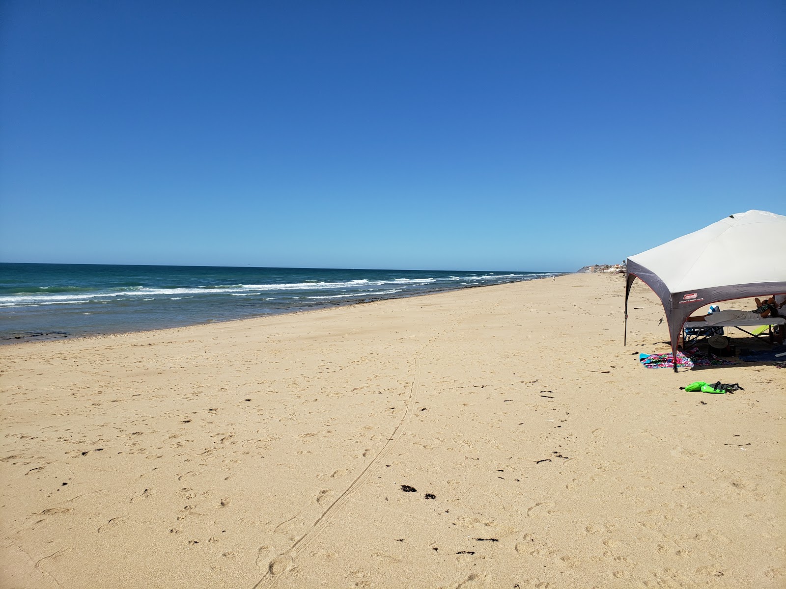 Foto av Playa Del Este med ljus sand yta