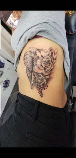 Explore rock tattoo ideas, creative tattoo ideas in Richmond, available at Captured Moment Tattoos