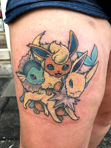 Find tattoo ideas for woman on leg for your next unique tattoo in Jefferson City at The Ink Sling Studio