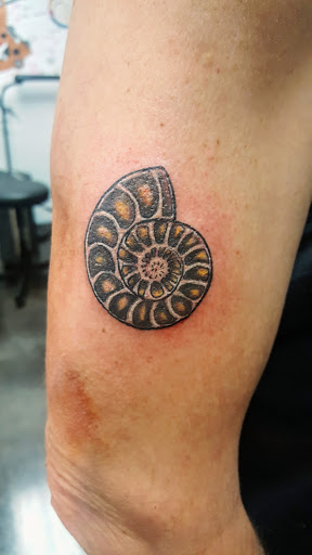 Explore saint michael tattoo ideas, creative tattoo ideas in Knoxville, available at Wicked Ink Tattoo & Body Piercing