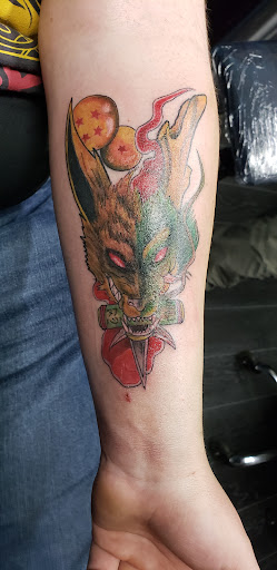 Explore honeycomb tattoo ideas, creative tattoo ideas in Laurel, available at Ambitious Creations Tattoo and Piercing Studio