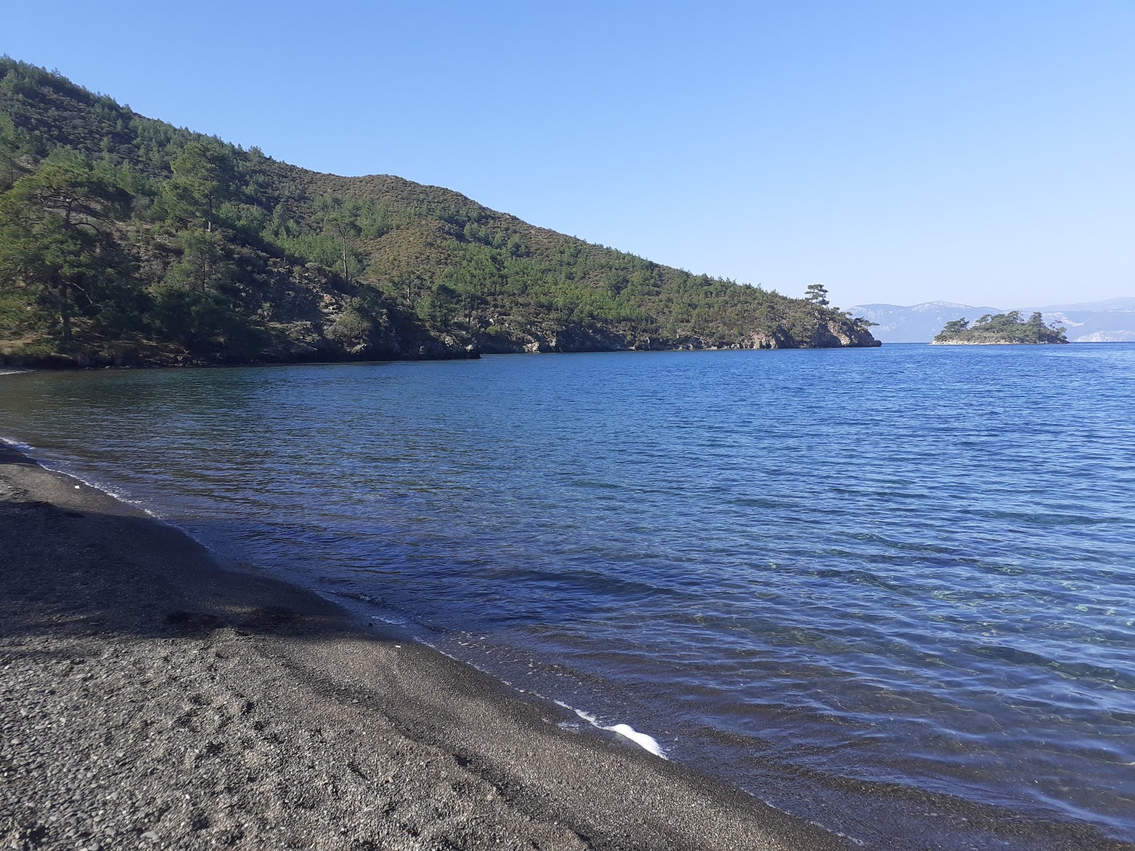 Fotografie cu Cacate Bay beach amplasat într-o zonă naturală