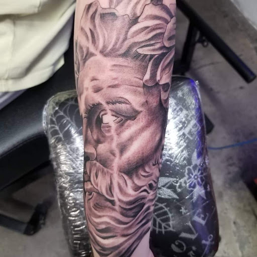 Tattoo Shop «The Corner Tattoo and Piercing Studio», reviews and photos, 112 Dixie Ln, Cocoa Beach, FL 32931, USA