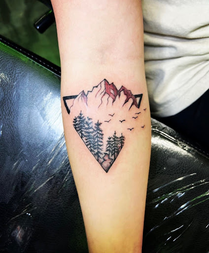 Explore mothman tattoo ideas, creative tattoo ideas in Peoria, available at Modern Ink Tattoo