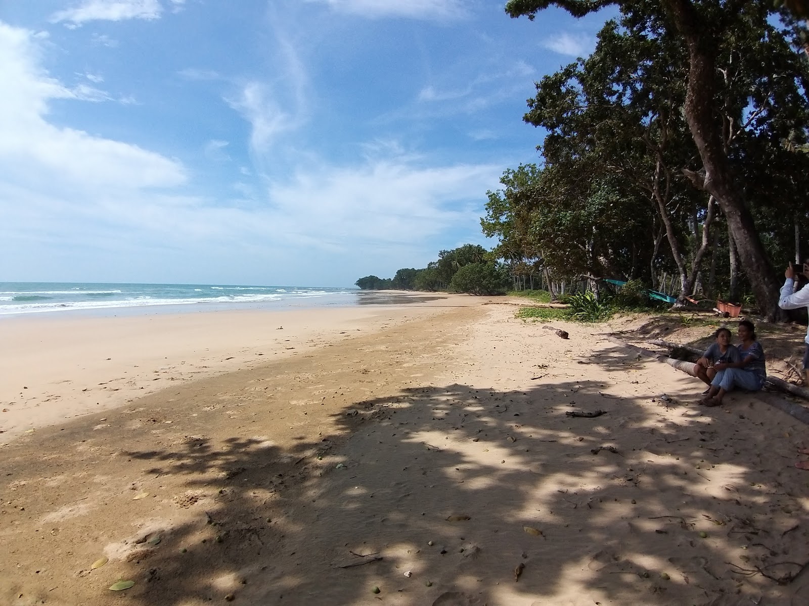 Foto di Napsan Beach con una superficie del sabbia beige