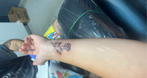 Explore hip bone tattoo ideas, creative tattoo ideas in London, available at Distinction Tattoo Studio