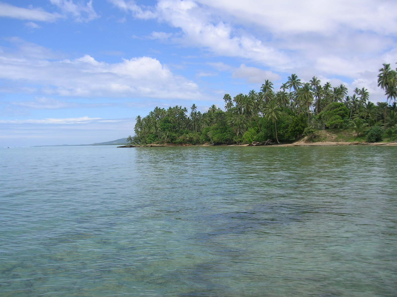 Kasavu Beach的照片 带有明亮的沙子表面