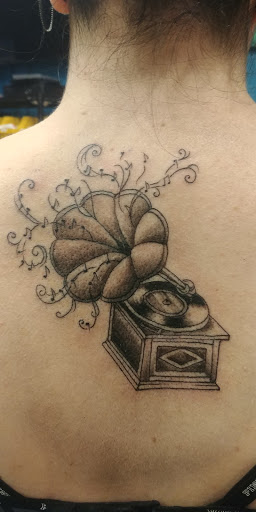 Tattoo Shop «Lucky Gal Tattoo & Piercing», reviews and photos, 3023 SW 9th St, Des Moines, IA 50315, USA