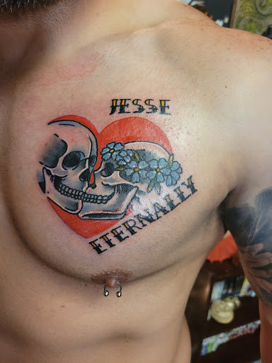 Explore boss tattoo ideas, creative tattoo ideas in Anniston, available at Lucid Dreams Tattoos and Piercings