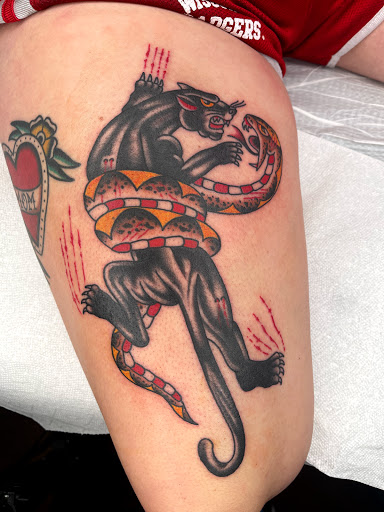 Explore neck tattoos for men ideas, creative tattoo ideas in Johnson City, available at Gold Cross Tattoo Co.