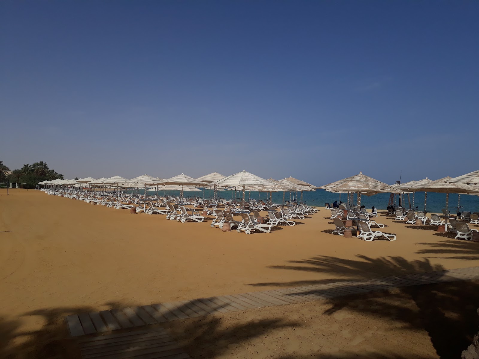 Fotografie cu Stella di Mare Beach - locul popular printre cunoscătorii de relaxare