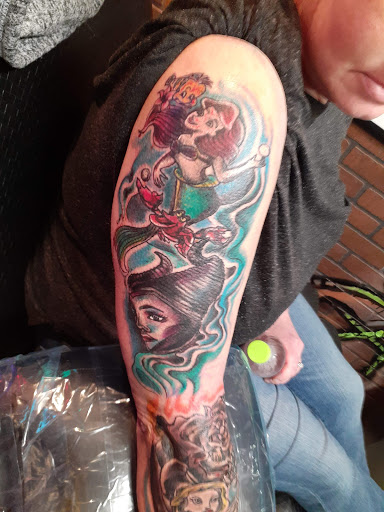 Explore ideas for stomach tattoos, creative tattoo ideas in Muncie, available at Obscura Tattoo shop and Oddity Collective