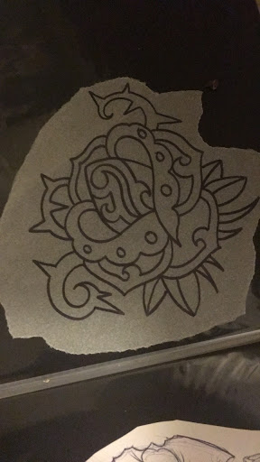 Explore tricep tattoo ideas, creative tattoo ideas in Milford, available at Golden Hammer Tattoo Studios