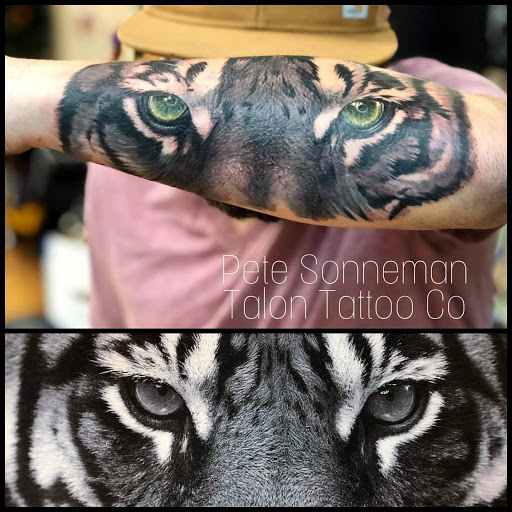 Explore tattoo ideas tribal arm, creative tattoo ideas in Garden City, available at Talon Tattoo Co