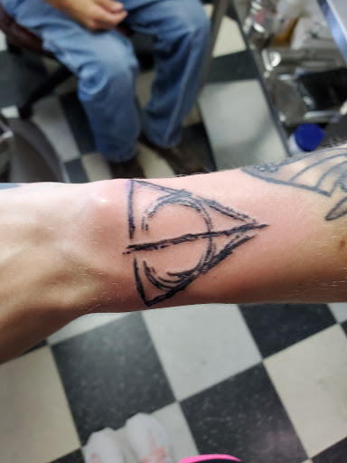 Explore boss tattoo ideas, creative tattoo ideas in Columbia, available at Animated Canvas Custom Tattoo