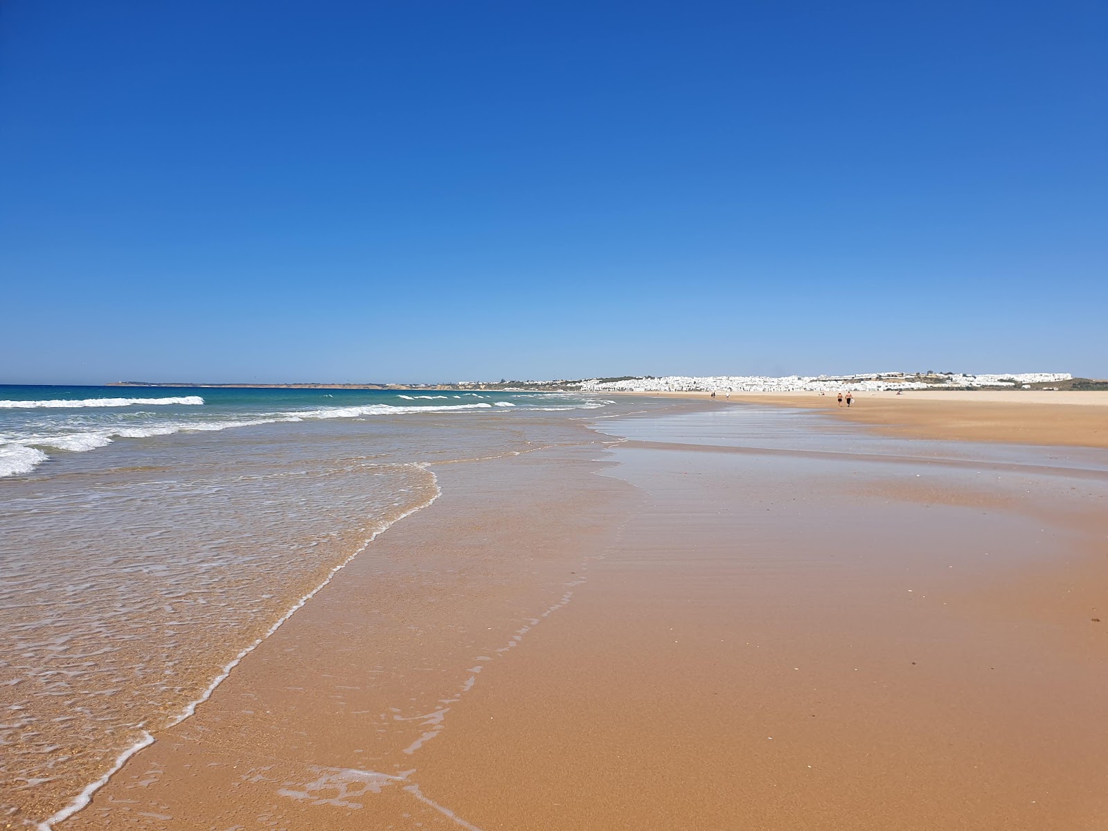 Foto von Playa de Castilobo mit beiger sand Oberfläche