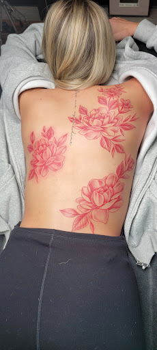 Explore belly button tattoo ideas, creative tattoo ideas in West Columbia, available at Justice Ink Tattoos