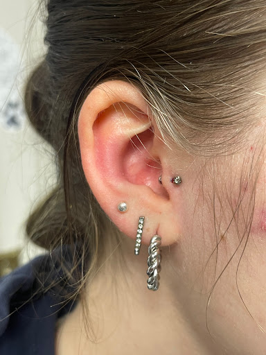 Explore women's arm tattoo ideas, creative tattoo ideas in New Hampton, available at Crescent Moon Tattoo