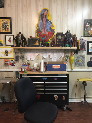 Find christmas tattoo ideas for your next unique tattoo in Benton at Three KingsTattoos