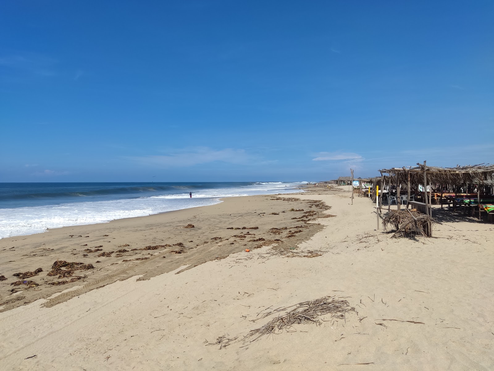 Fotografie cu Playa Barra de Coyuca cu o suprafață de nisip strălucitor