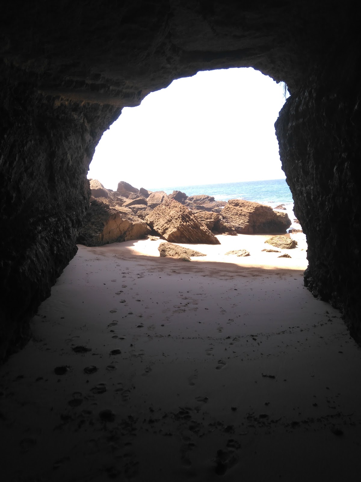 Foto di Playa de la Cortina con baia piccola