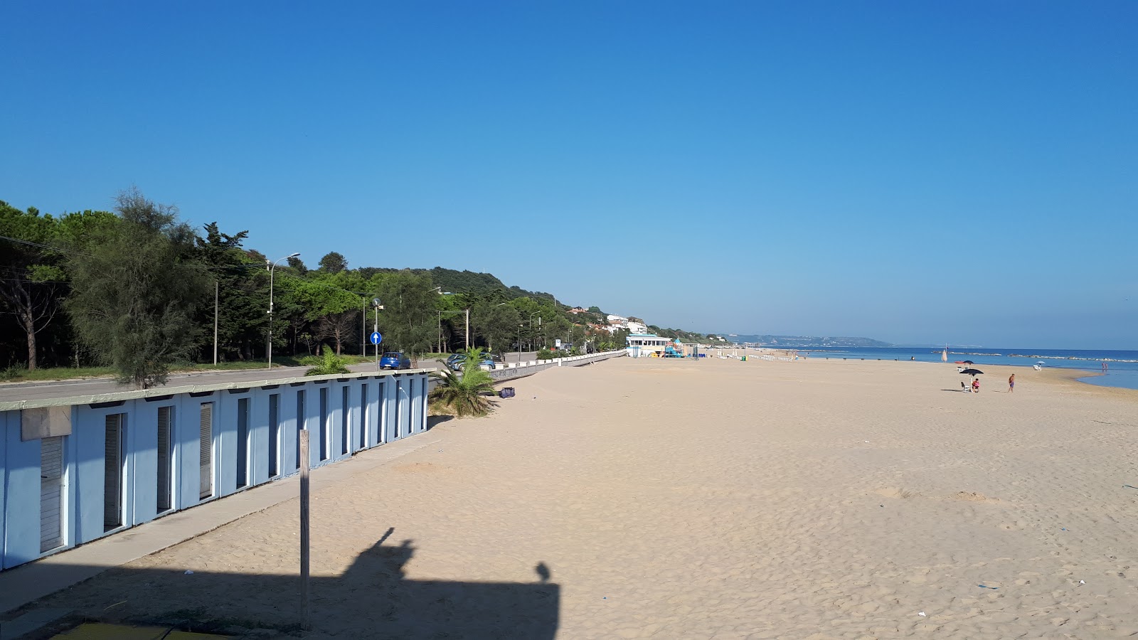 Photo de Spiaggia Le Morge avec sable fin brun de surface