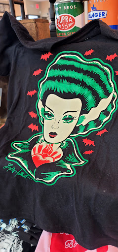 Explore afro tattoo ideas, creative tattoo ideas in Lees Summit, available at The Cherry Bomb Tattoo Co.